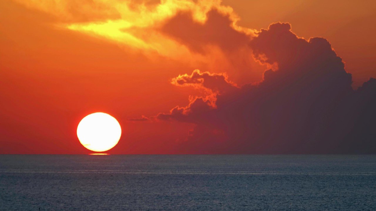 The setting sun kissed the sea | London Photography Awards